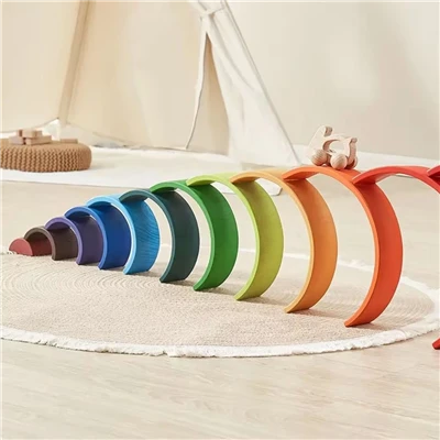 Houten stapelbaar regenboogspeelgoed